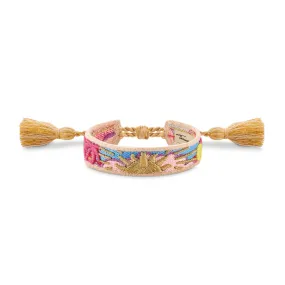 Bracelet with various ornaments in pink, blue, green & gold