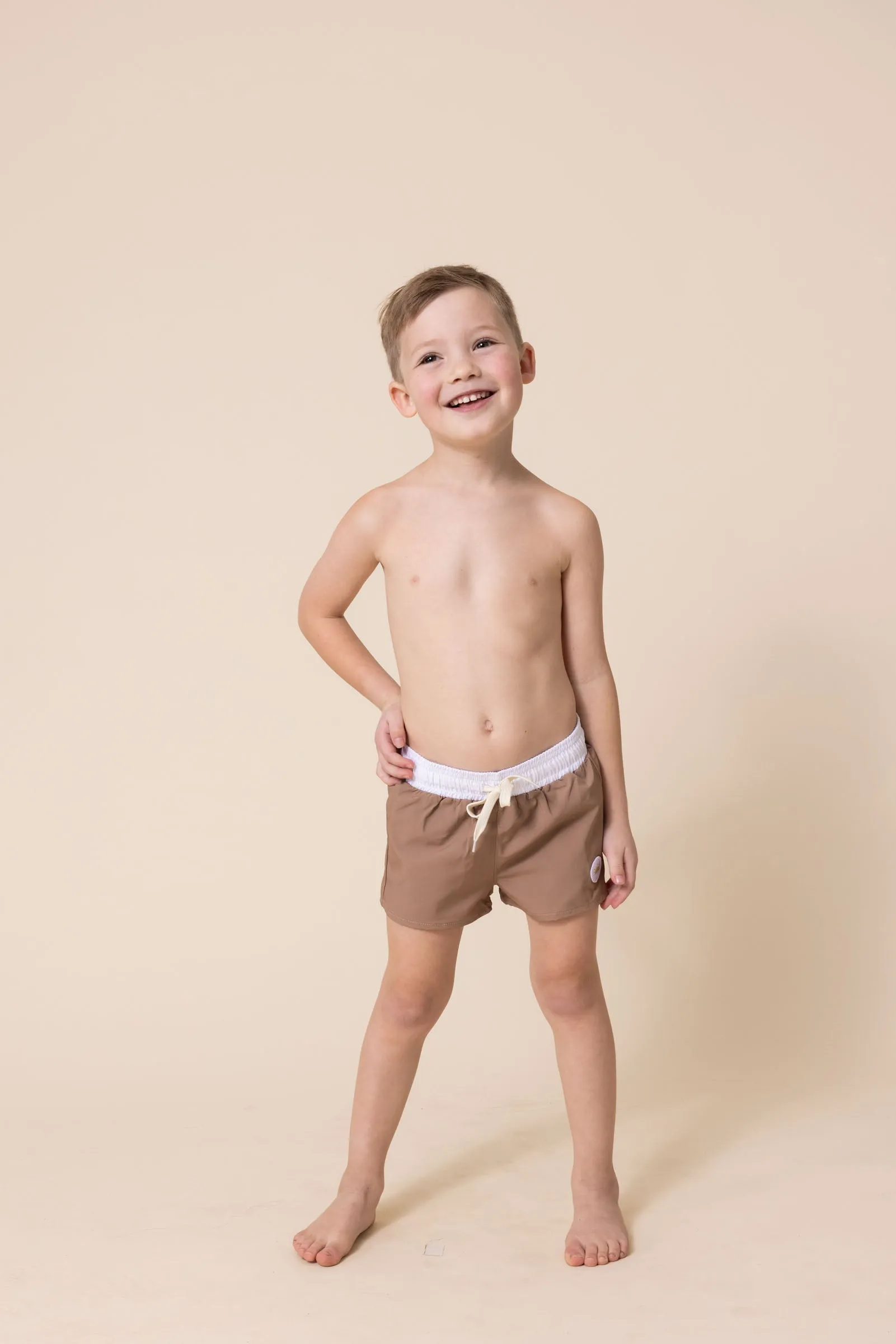 Brown boys swimming trunks